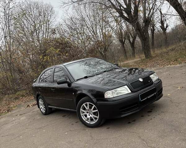 Черный Шкода Октавия, объемом двигателя 1.8 л и пробегом 297 тыс. км за 6500 $, фото 1 на Automoto.ua