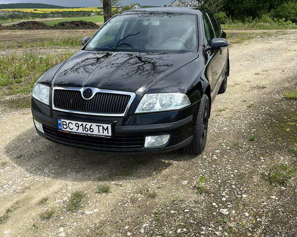 Черный Шкода Октавия, объемом двигателя 1.6 л и пробегом 200 тыс. км за 5200 $, фото 1 на Automoto.ua