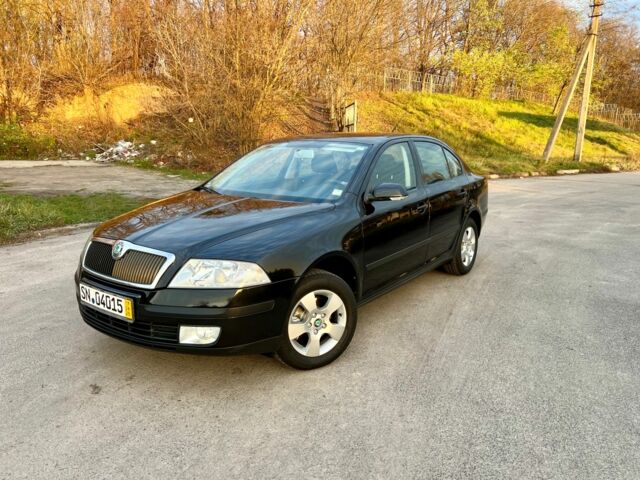 Чорний Шкода Октавія, об'ємом двигуна 1.6 л та пробігом 220 тис. км за 7500 $, фото 1 на Automoto.ua