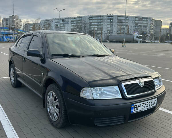 Черный Шкода Октавия, объемом двигателя 1.6 л и пробегом 263 тыс. км за 5600 $, фото 1 на Automoto.ua