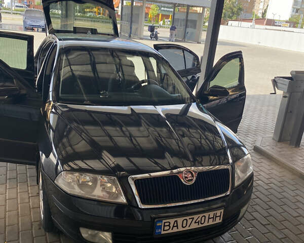 Черный Шкода Октавия, объемом двигателя 1.6 л и пробегом 333 тыс. км за 6500 $, фото 1 на Automoto.ua