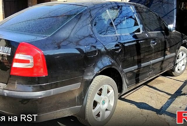 Черный Шкода Октавия, объемом двигателя 2 л и пробегом 270 тыс. км за 4300 $, фото 1 на Automoto.ua