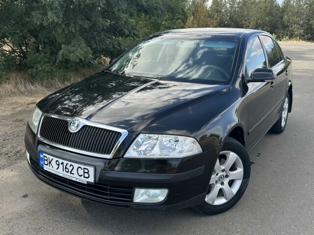 Черный Шкода Октавия, объемом двигателя 2 л и пробегом 240 тыс. км за 5900 $, фото 1 на Automoto.ua