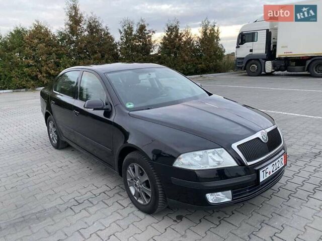 Черный Шкода Октавия, объемом двигателя 1.6 л и пробегом 206 тыс. км за 7150 $, фото 1 на Automoto.ua