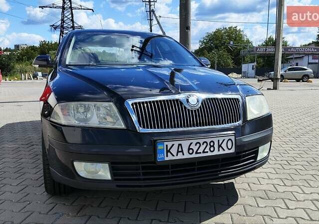Черный Шкода Октавия, объемом двигателя 1.98 л и пробегом 245 тыс. км за 4800 $, фото 1 на Automoto.ua