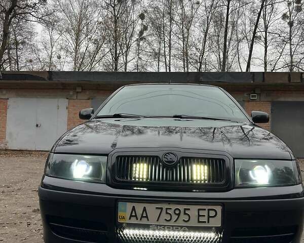 Черный Шкода Октавия, объемом двигателя 1.8 л и пробегом 265 тыс. км за 7000 $, фото 1 на Automoto.ua