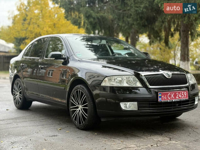 Чорний Шкода Октавія, об'ємом двигуна 1.6 л та пробігом 157 тис. км за 8599 $, фото 1 на Automoto.ua