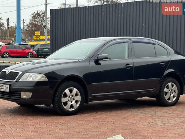 Черный Шкода Октавия, объемом двигателя 2 л и пробегом 230 тыс. км за 6950 $, фото 1 на Automoto.ua