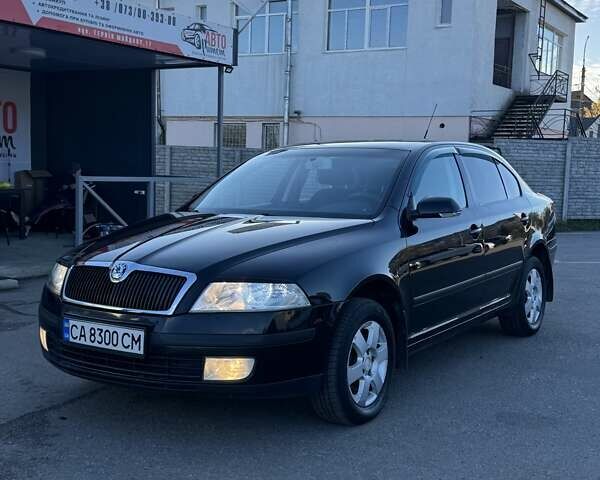 Черный Шкода Октавия, объемом двигателя 1.98 л и пробегом 192 тыс. км за 6400 $, фото 1 на Automoto.ua