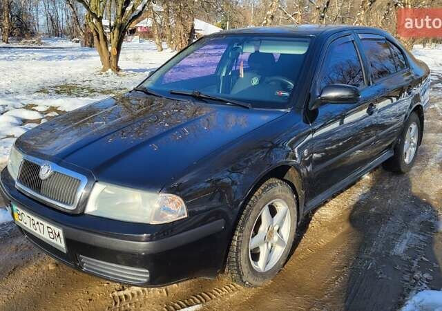 Черный Шкода Октавия, объемом двигателя 1.6 л и пробегом 230 тыс. км за 4800 $, фото 1 на Automoto.ua