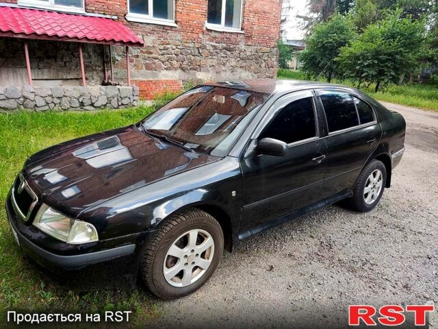 Чорний Шкода Октавія, об'ємом двигуна 1.8 л та пробігом 185 тис. км за 4500 $, фото 1 на Automoto.ua