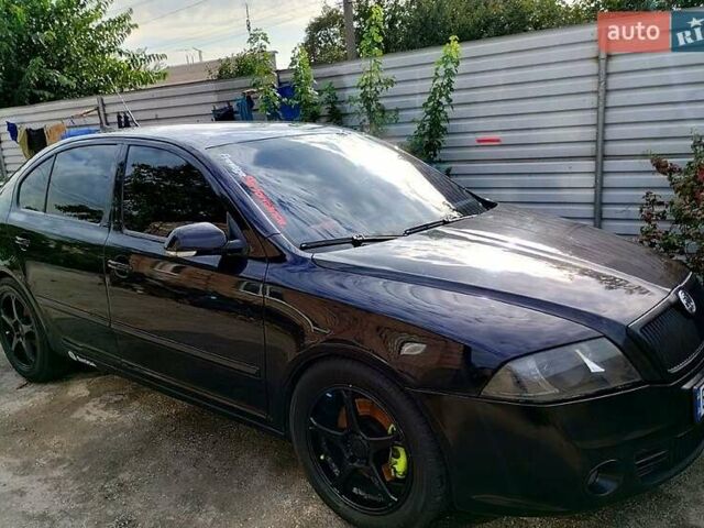 Черный Шкода Октавия, объемом двигателя 2 л и пробегом 265 тыс. км за 7500 $, фото 1 на Automoto.ua