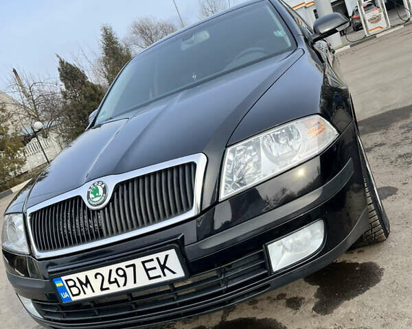 Черный Шкода Октавия, объемом двигателя 1.6 л и пробегом 216 тыс. км за 7600 $, фото 1 на Automoto.ua