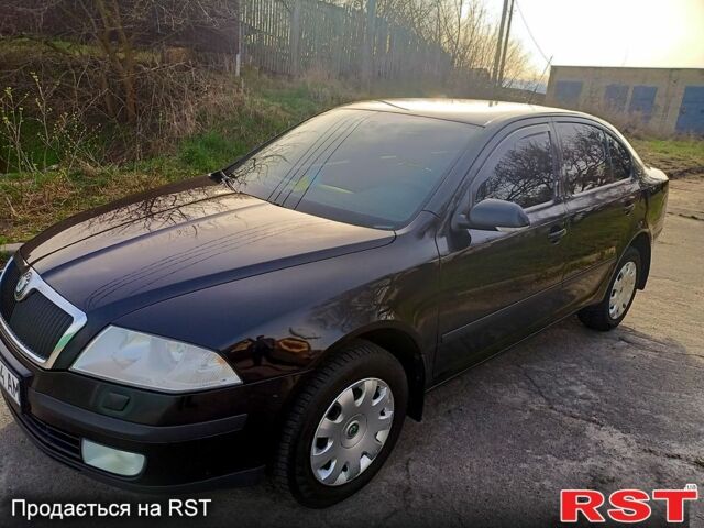 Черный Шкода Октавия, объемом двигателя 1.6 л и пробегом 240 тыс. км за 7200 $, фото 1 на Automoto.ua