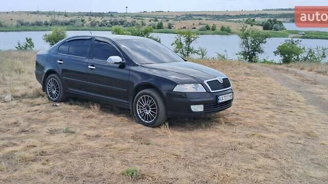 Черный Шкода Октавия, объемом двигателя 1.6 л и пробегом 290 тыс. км за 6350 $, фото 1 на Automoto.ua