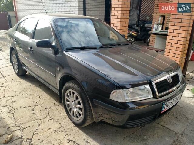 Черный Шкода Октавия, объемом двигателя 1.6 л и пробегом 205 тыс. км за 5900 $, фото 1 на Automoto.ua