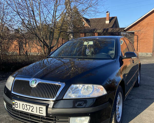 Чорний Шкода Октавія, об'ємом двигуна 1.98 л та пробігом 241 тис. км за 7500 $, фото 1 на Automoto.ua