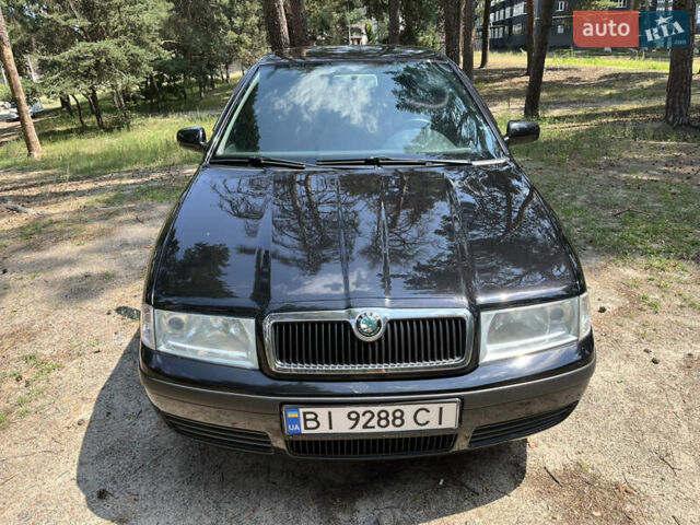 Черный Шкода Октавия, объемом двигателя 1.6 л и пробегом 200 тыс. км за 5800 $, фото 1 на Automoto.ua