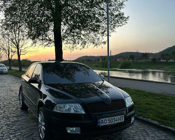 Черный Шкода Октавия, объемом двигателя 2 л и пробегом 154 тыс. км за 7000 $, фото 1 на Automoto.ua