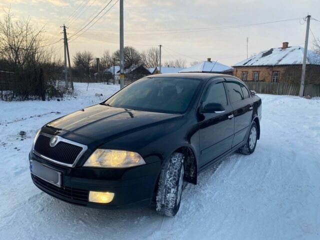 Чорний Шкода Октавія, об'ємом двигуна 1.6 л та пробігом 263 тис. км за 6750 $, фото 1 на Automoto.ua