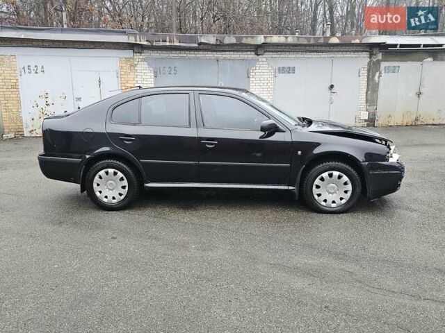 Черный Шкода Октавия, объемом двигателя 1.6 л и пробегом 210 тыс. км за 2200 $, фото 1 на Automoto.ua