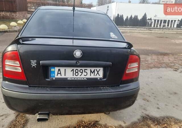 Черный Шкода Октавия, объемом двигателя 1.8 л и пробегом 319 тыс. км за 7400 $, фото 1 на Automoto.ua