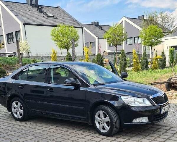 Черный Шкода Октавия, объемом двигателя 1.8 л и пробегом 228 тыс. км за 7000 $, фото 1 на Automoto.ua