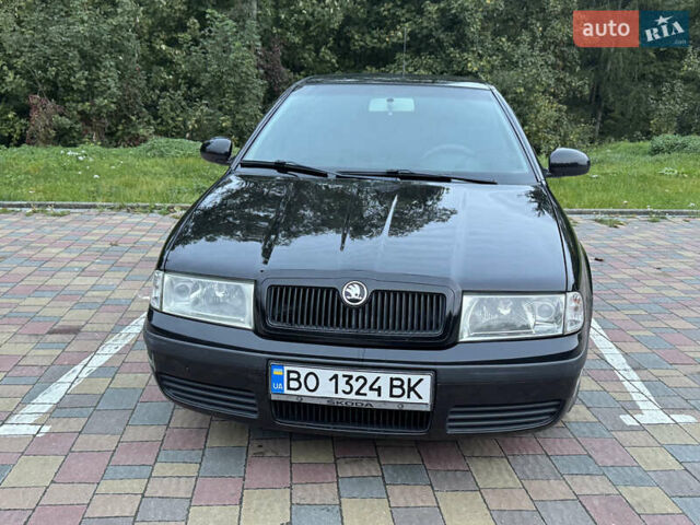 Черный Шкода Октавия, объемом двигателя 1.6 л и пробегом 225 тыс. км за 5650 $, фото 1 на Automoto.ua
