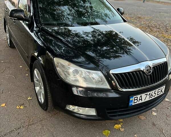 Черный Шкода Октавия, объемом двигателя 1.8 л и пробегом 210 тыс. км за 6800 $, фото 1 на Automoto.ua