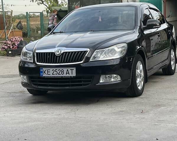 Черный Шкода Октавия, объемом двигателя 1.4 л и пробегом 180 тыс. км за 7200 $, фото 1 на Automoto.ua