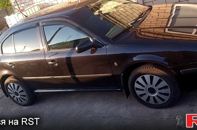 Черный Шкода Октавия, объемом двигателя 1.6 л и пробегом 226 тыс. км за 5500 $, фото 1 на Automoto.ua