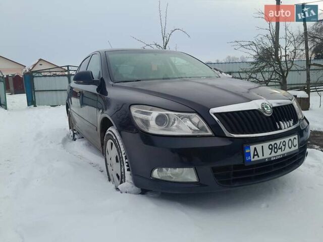 Черный Шкода Октавия, объемом двигателя 1.6 л и пробегом 274 тыс. км за 5887 $, фото 1 на Automoto.ua