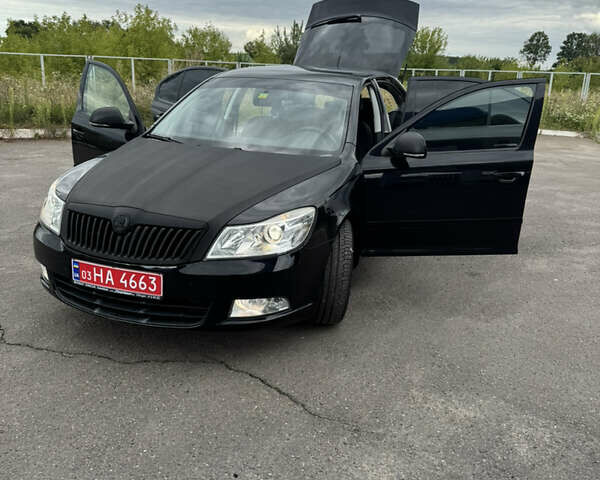 Черный Шкода Октавия, объемом двигателя 1.4 л и пробегом 168 тыс. км за 8000 $, фото 1 на Automoto.ua