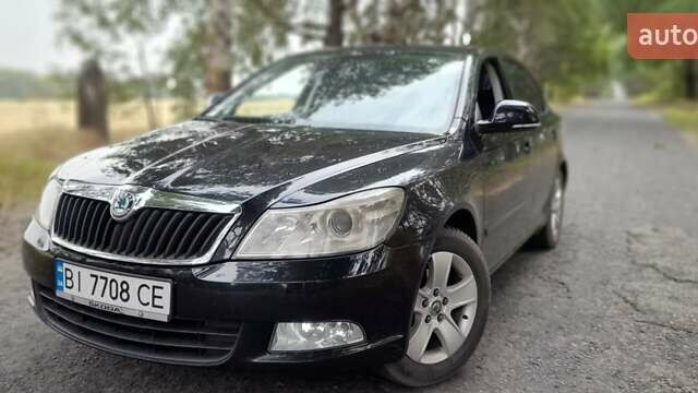 Черный Шкода Октавия, объемом двигателя 1.6 л и пробегом 239 тыс. км за 7700 $, фото 1 на Automoto.ua