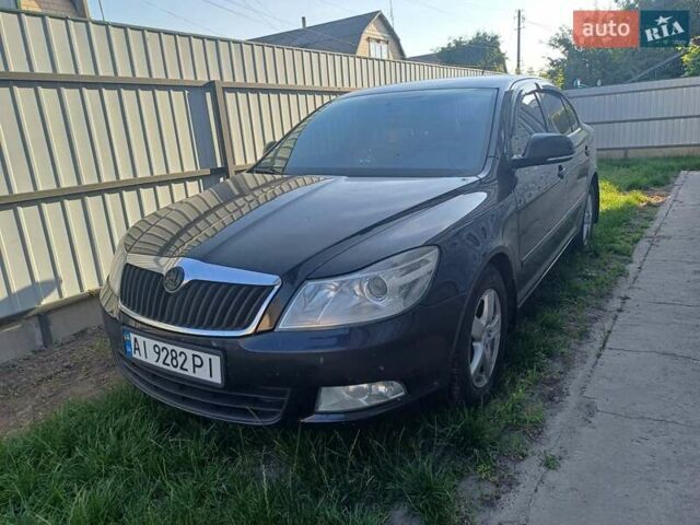 Черный Шкода Октавия, объемом двигателя 1.6 л и пробегом 260 тыс. км за 10000 $, фото 1 на Automoto.ua