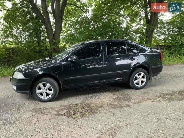 Черный Шкода Октавия, объемом двигателя 1.8 л и пробегом 184 тыс. км за 7200 $, фото 1 на Automoto.ua