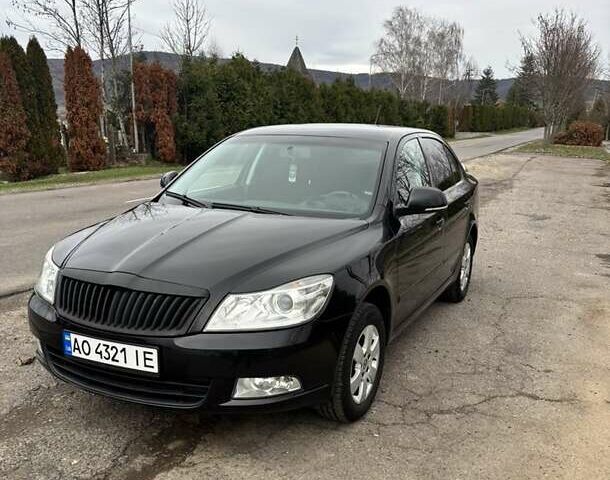 Чорний Шкода Октавія, об'ємом двигуна 1.6 л та пробігом 217 тис. км за 7199 $, фото 1 на Automoto.ua