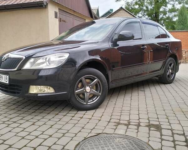 Чорний Шкода Октавія, об'ємом двигуна 1.6 л та пробігом 210 тис. км за 8700 $, фото 1 на Automoto.ua