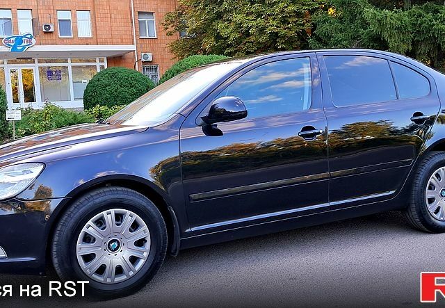 Черный Шкода Октавия, объемом двигателя 2 л и пробегом 150 тыс. км за 8700 $, фото 1 на Automoto.ua
