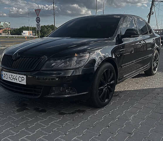 Черный Шкода Октавия, объемом двигателя 1.4 л и пробегом 217 тыс. км за 8300 $, фото 1 на Automoto.ua