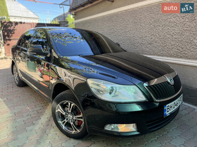 Черный Шкода Октавия, объемом двигателя 1.8 л и пробегом 170 тыс. км за 7900 $, фото 1 на Automoto.ua