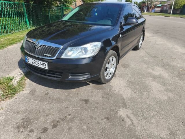 Черный Шкода Октавия, объемом двигателя 1.6 л и пробегом 250 тыс. км за 8000 $, фото 1 на Automoto.ua