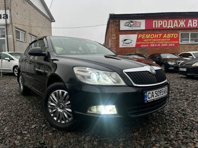 Чорний Шкода Октавія, об'ємом двигуна 1.8 л та пробігом 173 тис. км за 7700 $, фото 1 на Automoto.ua
