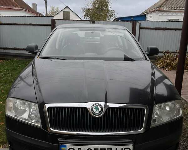 Черный Шкода Октавия, объемом двигателя 1.6 л и пробегом 204 тыс. км за 7800 $, фото 1 на Automoto.ua