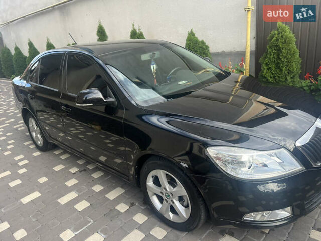 Черный Шкода Октавия, объемом двигателя 1.6 л и пробегом 268 тыс. км за 8350 $, фото 1 на Automoto.ua