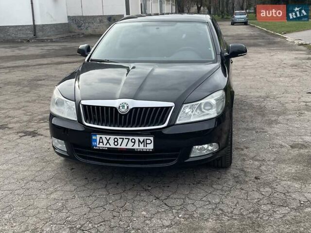 Чорний Шкода Октавія, об'ємом двигуна 1.8 л та пробігом 210 тис. км за 9600 $, фото 1 на Automoto.ua