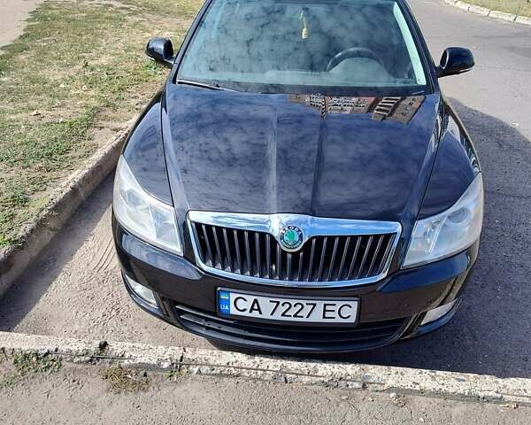 Черный Шкода Октавия, объемом двигателя 1.6 л и пробегом 149 тыс. км за 10500 $, фото 1 на Automoto.ua