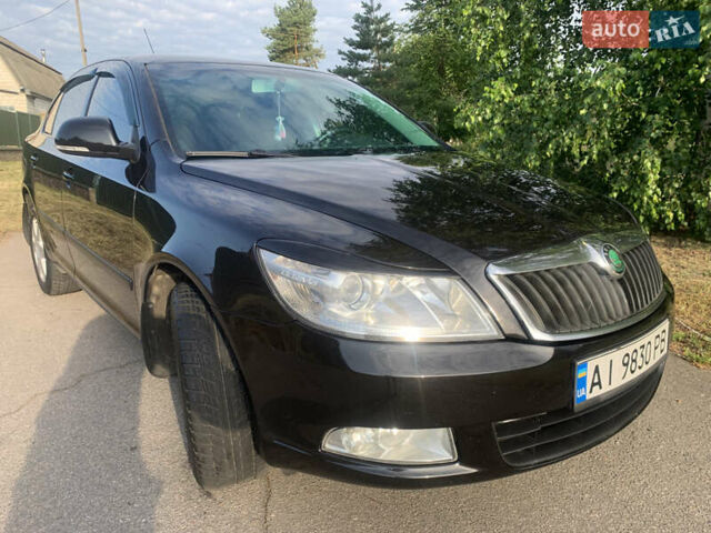 Шкода Октавія 2011 у Белой Церкве на Automoto.ua Чорний Шкода Октавія, об'ємом двигуна 1.8 л та пробігом 303 тис. км за 6750 $, фото 1 на Automoto.ua