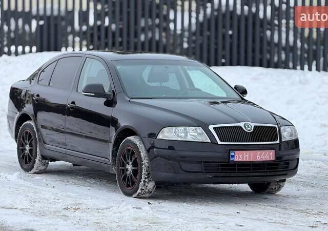 Черный Шкода Октавия, объемом двигателя 1.6 л и пробегом 249 тыс. км за 7200 $, фото 1 на Automoto.ua