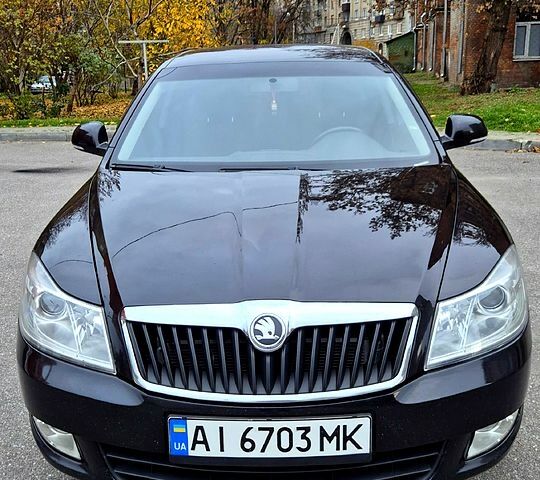 Черный Шкода Октавия, объемом двигателя 2 л и пробегом 232 тыс. км за 9800 $, фото 1 на Automoto.ua